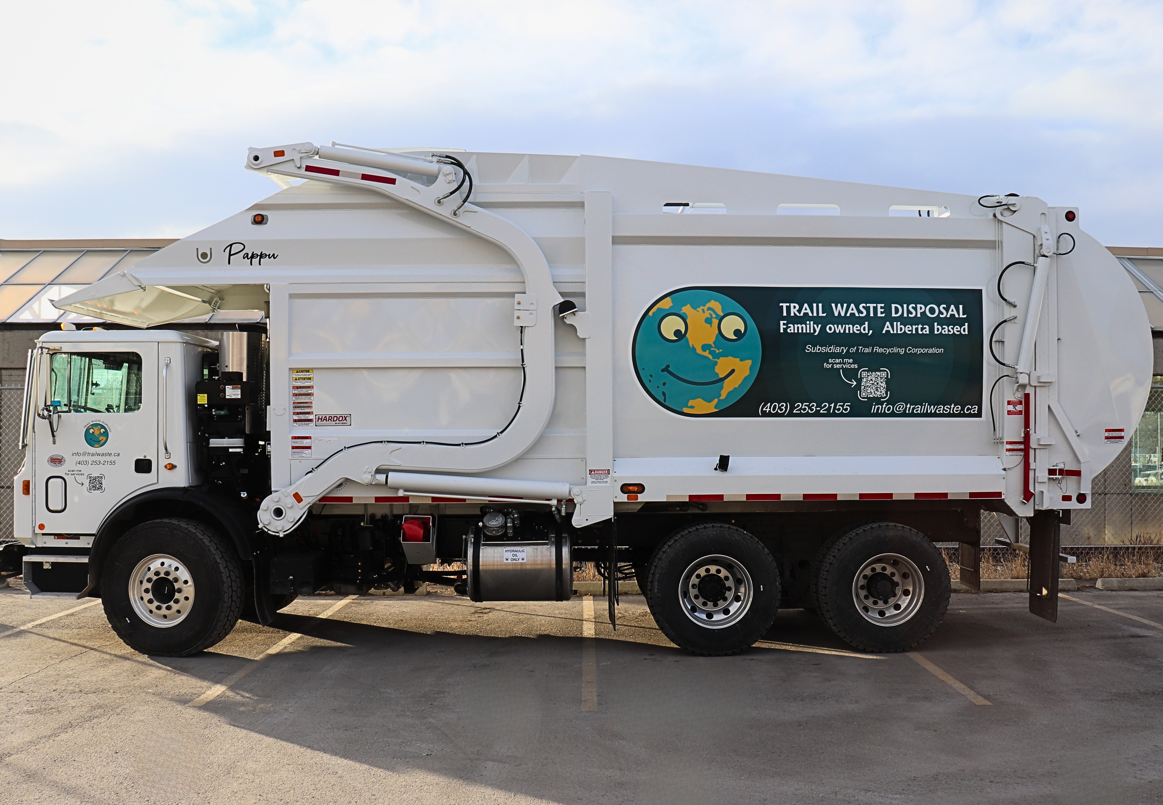 Trail Waste Disposal front-load garbage truck in Calgary